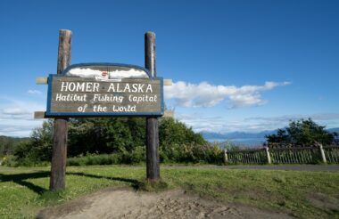 Homer Alaska Sign looking over the Kachemak Bay